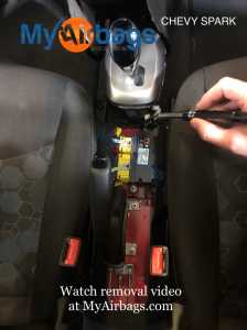 LOCATION CHEVY CHEVROLET SPARK 2015 2016 2017 2018 2019 AIRBAG SDM DERM CONTROL MODULE COMPUTER REMOVAL REMOVE INSTALL CENTER CONSOLE